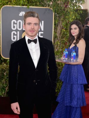 Girl-Posing-Fiji-Water-2019-Golden-Globes-Red-Carpet