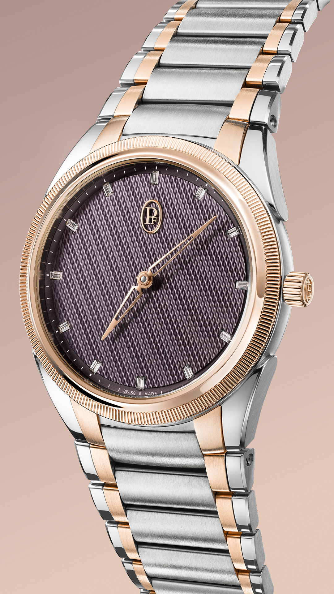 錶盤鑲有12枚長方形切割鑽石時標，色澤明淨，總重0.36克拉，襯18K玫瑰金鏤空三角形時針和分針，優美襯托時間流轉。PHOTO/ PARMIGIANI FLEURIER