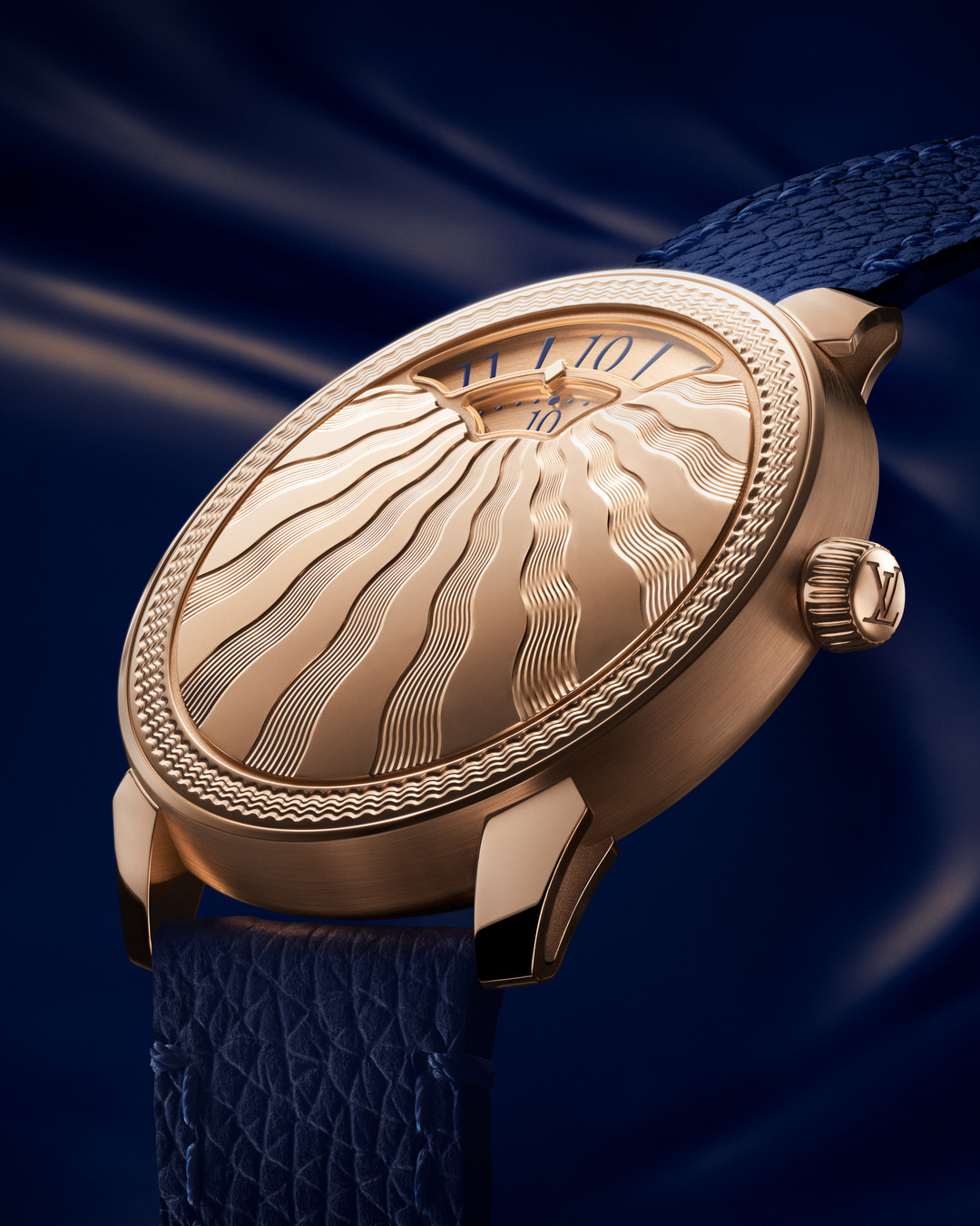 Tambour Convergence Guilloché 玫瑰金腕錶重新演繹 37 毫米復古風格視窗式顯示腕錶。PHOTO/ Louis Vuitton 